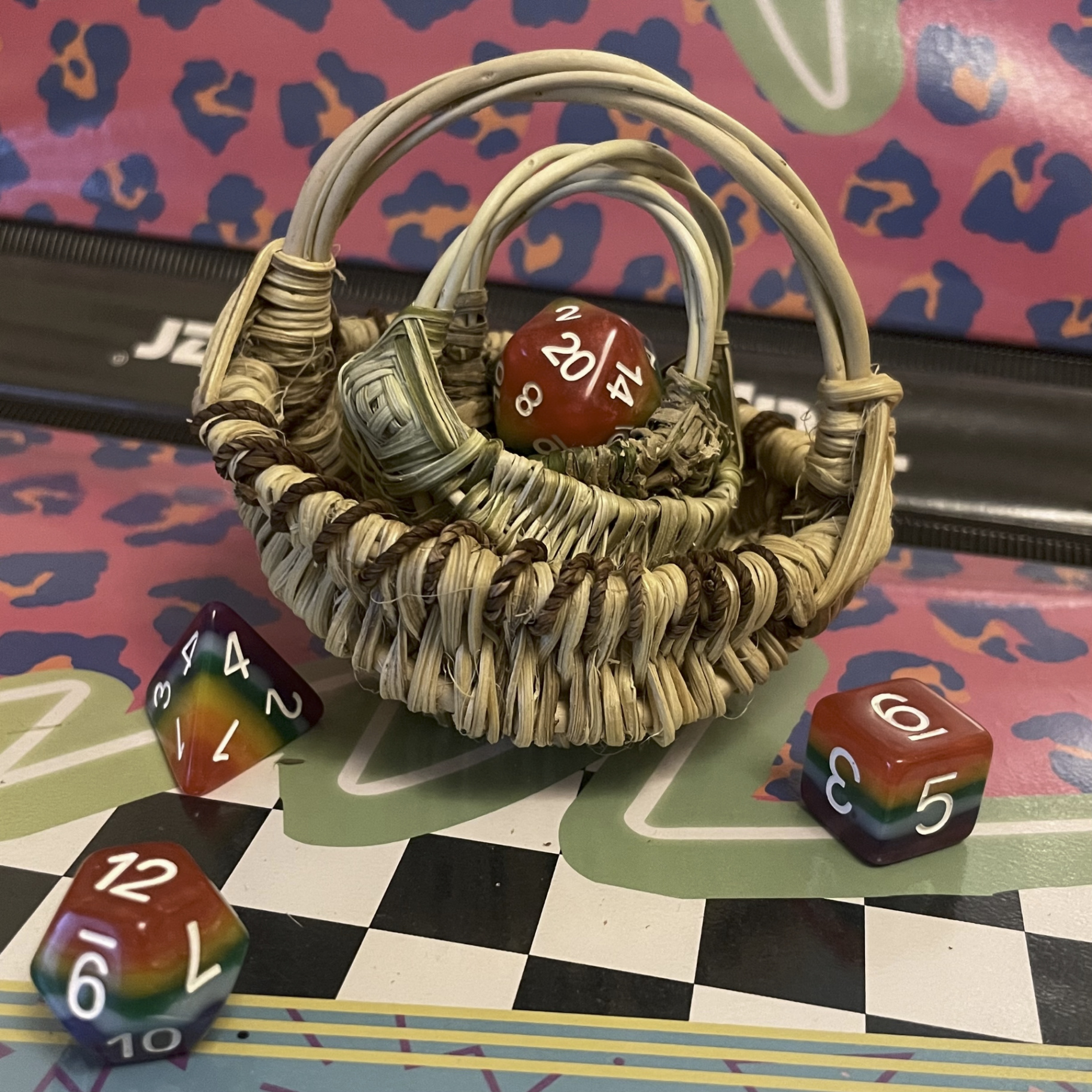 Hand-woven North Georgia basket holding colorful dice